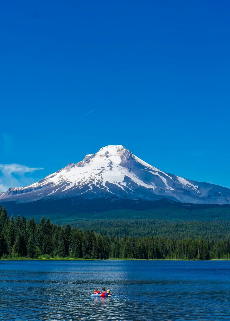 Blue lake with volcano in the background